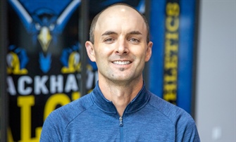 New Coach Hagen Brings Experience, Enthusiasm to Talons Golf Team