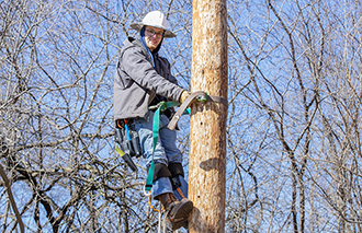 EPD student Drexel Norman on a pole