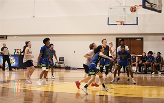 Men's Basketball Team Falls in Home Opener